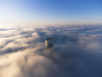 Buenos aires is covered in a fog that makes all buildings invisible, except one. the alvear tower.
