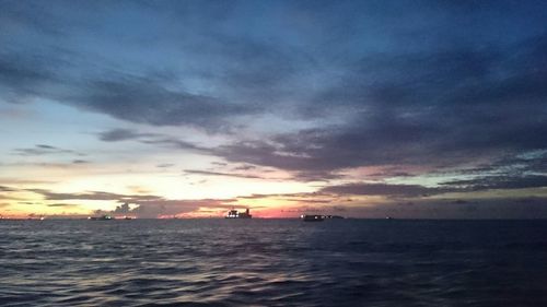 Scenic view of sea at sunset