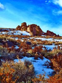 Scenic view of rock formation against sky