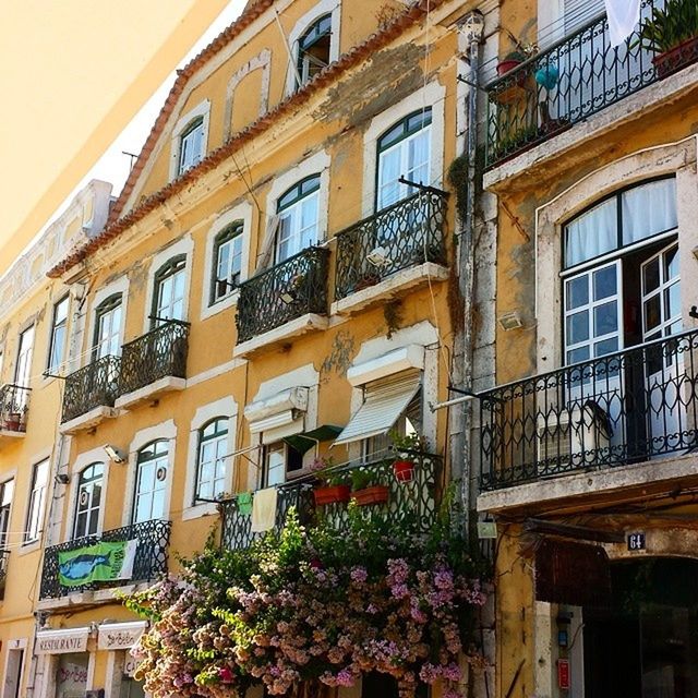 LOW ANGLE VIEW OF RESIDENTIAL BUILDING