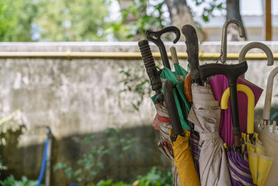 Close-up of clothespins hanging on clothesline