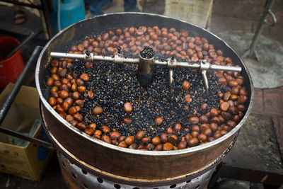 High angle view of chestnut in grinder