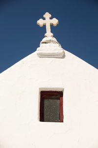 Low angle view of white building against clear sky