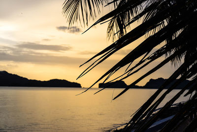 Scenic view of sea against sky at sunset