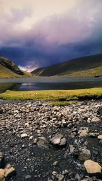 Scenic view of sea against cloudy sky