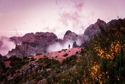 Scenic view of rocky mountains against sky