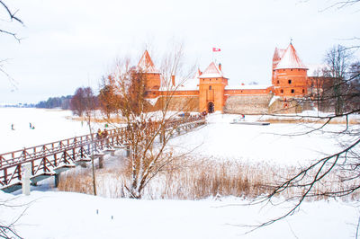 Buildings against sky during winter