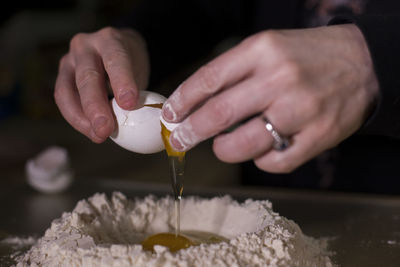 Close-up of hand holding ice cream cone