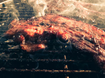 Close-up of fish on barbecue grill