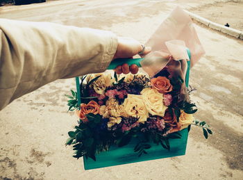 High angle view of hand holding bouquet