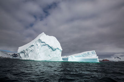 Scenic view of frozen sea against sky