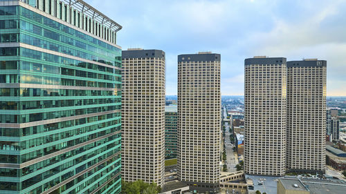 Low angle view of modern buildings against sky