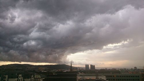 Storm clouds over cityscape