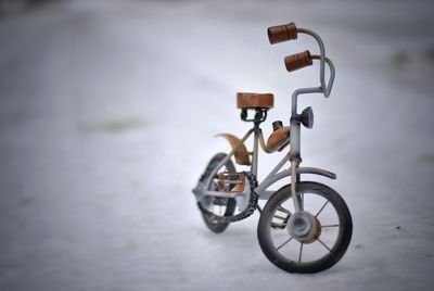 Close-up of bicycle wheel during winter
