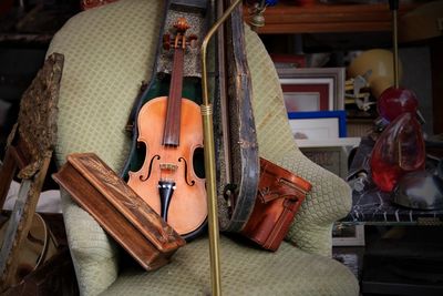 Cropped hand of man playing violin