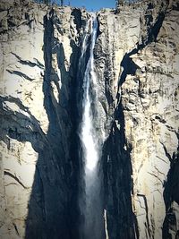 Close-up of waterfall against trees