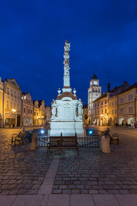 Buildings in city at night