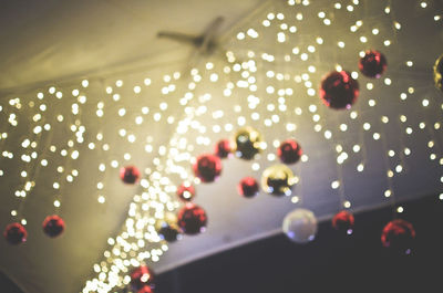 Close-up of illuminated street lights