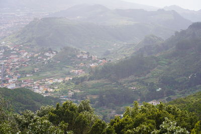 High angle view of trees and mountains