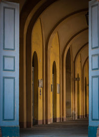 Rear view of man walking in building