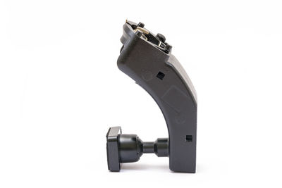Close-up of camera against white background