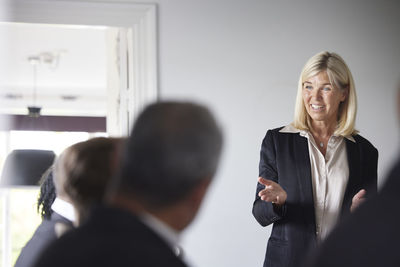 Smiling businesswoman at meeting