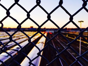Chainlink fence seen through chainlink fence