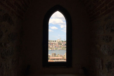 Buildings seen through window