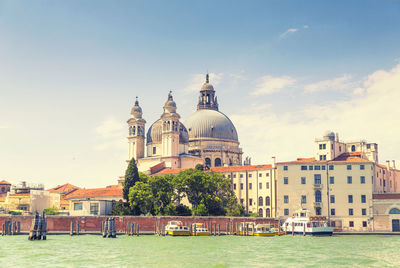 Picturesque summer view of santa maria della salute basilica, venice with famous water canals 