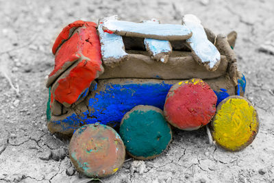 High angle view of multi colored umbrellas on sand