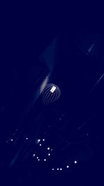 Low angle view of illuminated ceiling