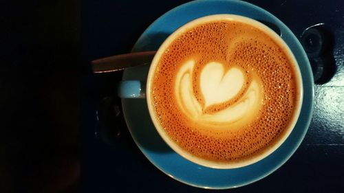 Close-up of coffee cup on table