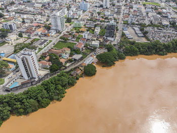 Flooded river with mud after construction of dam