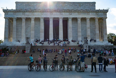 Group of people in front of historical building