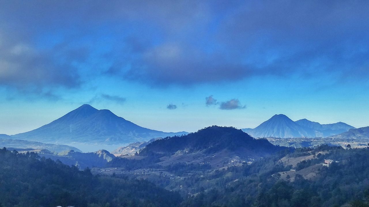 mountain, mountain range, scenics, tranquil scene, tranquility, beauty in nature, sky, landscape, snow, nature, snowcapped mountain, winter, cloud - sky, non-urban scene, cold temperature, idyllic, weather, cloud, blue, majestic