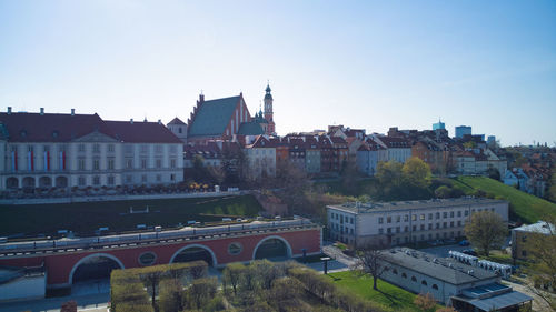 High angle view of buildings in city against clear sky