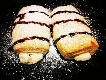 Close-up of ice cream over black background