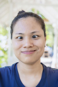 Amazed eyes of a teen young woman. young asian woman wearing casual clothes make fish face 