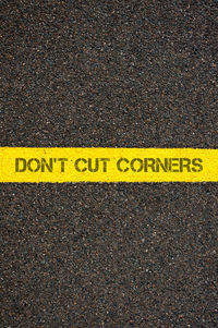 High angle view of yellow text on road