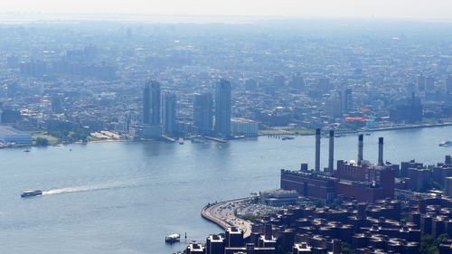 High angle view of city buildings at waterfront