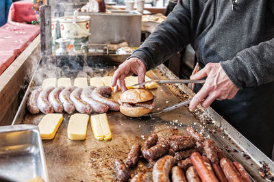 Midsection of person preparing food