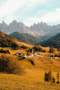Scenic view of landscape and mountains against sky