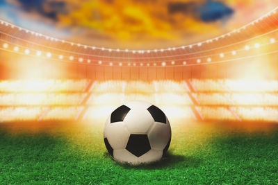 Close-up of soccer ball on field