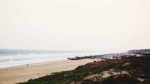 Scenic view of beach against clear sky