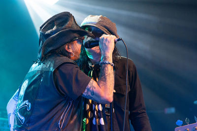 Panoramic shot of men on stage