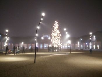 Illuminated street light at night