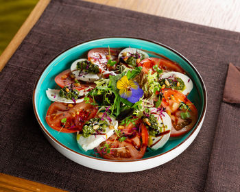 High angle view of salad in bowl on table