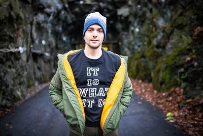 Portrait of young man standing outdoors