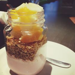 Close-up of ice cream in glass on table