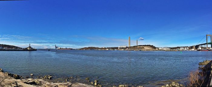 View of harbor against blue sky
